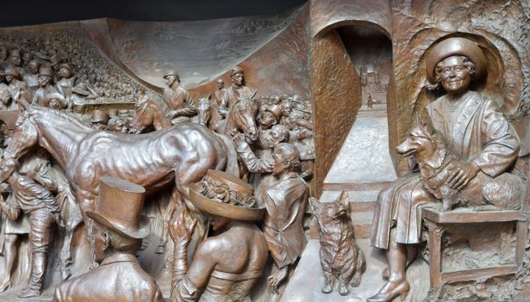 The Queen mother and her corgis on the Mall, London SW1A 2BJ