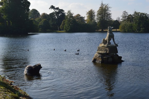 Lexi the dog checks out the Molossian Hound at Petworth House (similar to the original on show at the British Museum)