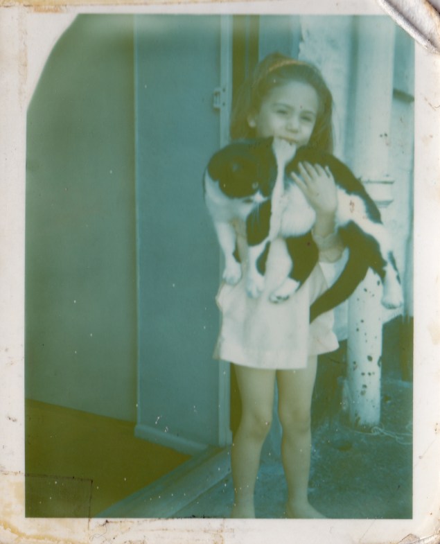 Yours truly with some poor, random cat I grabbed off the street whilst on holiday in Polperro, Cornwall. 1969